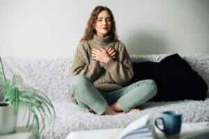 Woman relaxing alone and getting in some self-care for PTSD